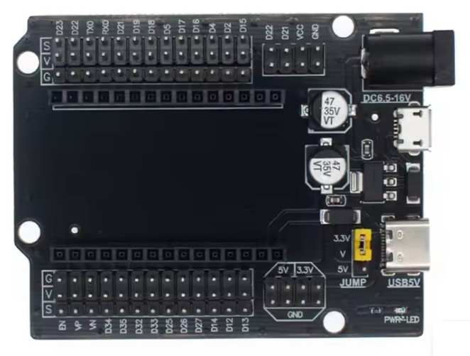 Shield de expansión negro para ESP32 de 30 pines, con filas G, V y S para cada pin, conector DC, entradas micro-USB y USB Tipo C y jumper de 3,3 V o 5 V.