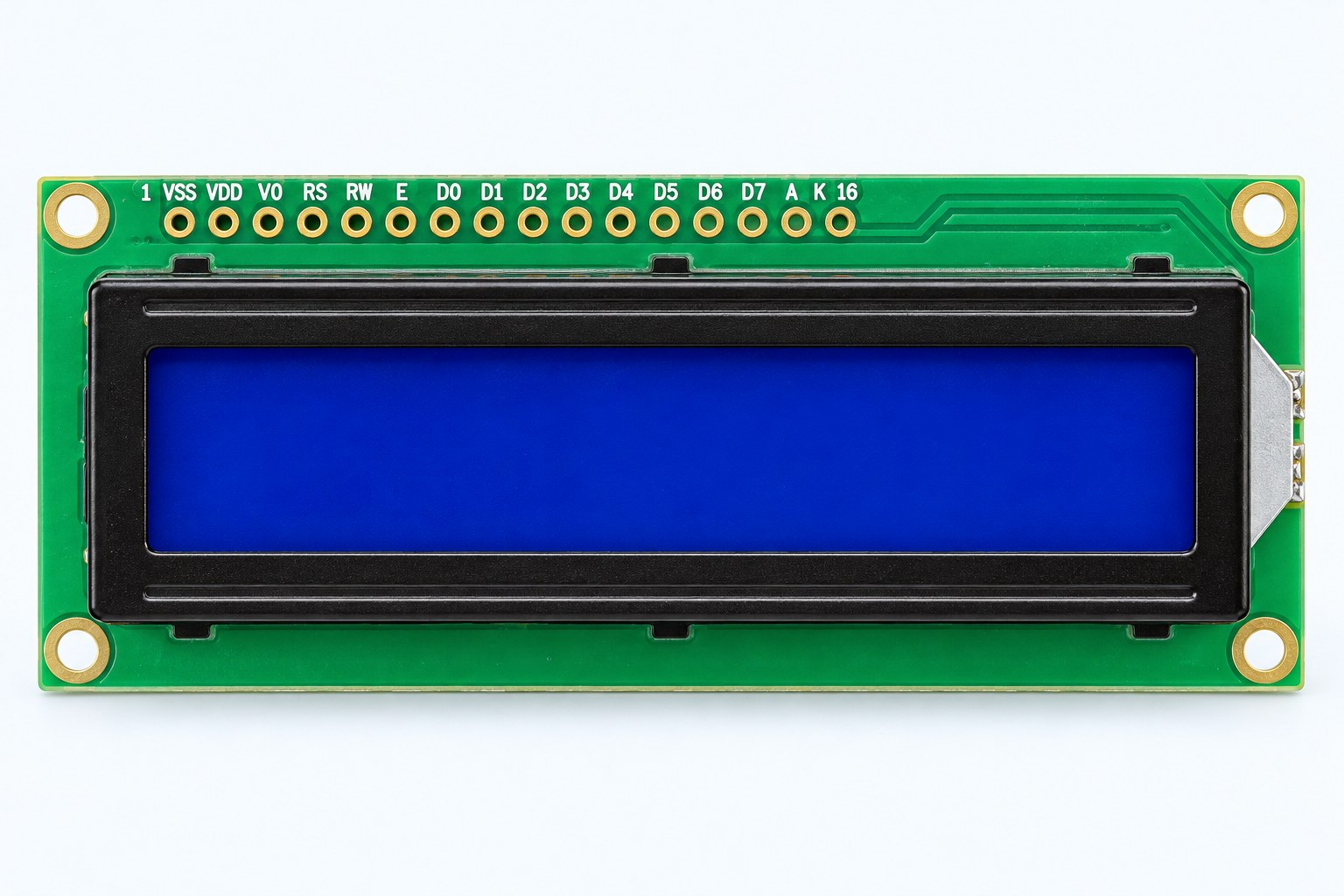 Pantalla LCD 16x2 1602A vista de frente: fondo azul, marco negro y placa verde con la fila de 16 pines rotulados de VSS a K en la parte superior.